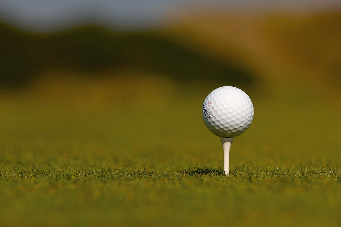 Close up of golf ball on golf tee