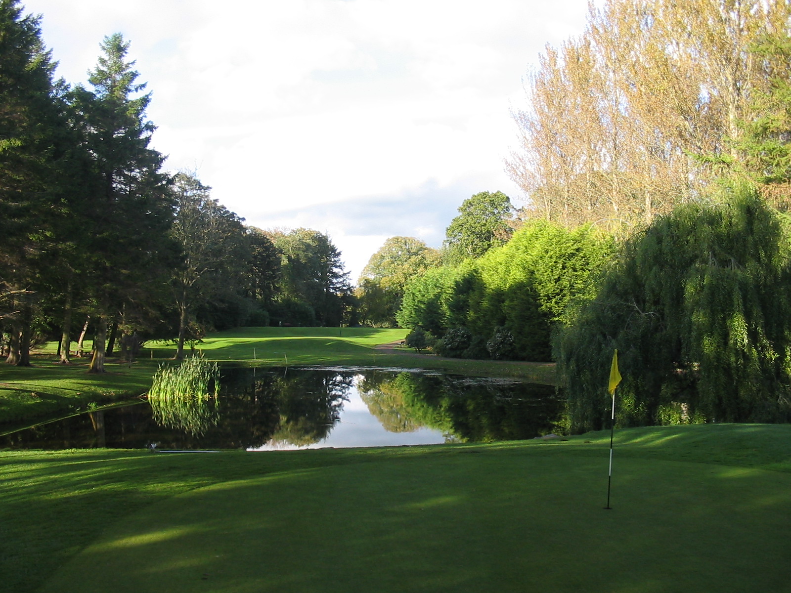 Golf course with small lake